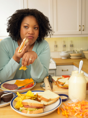 Woman stressed and overeating